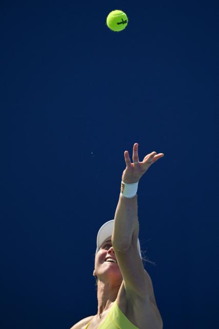 Russia's Liudmila Samsonova serves against Colombia's Emiliana Arango during their women's singles match at the Wuhan Open tennis tournament in Wuhan, Central China's Hubei province on October 7, 2025. (Photo by Adek BERRY / AFP)