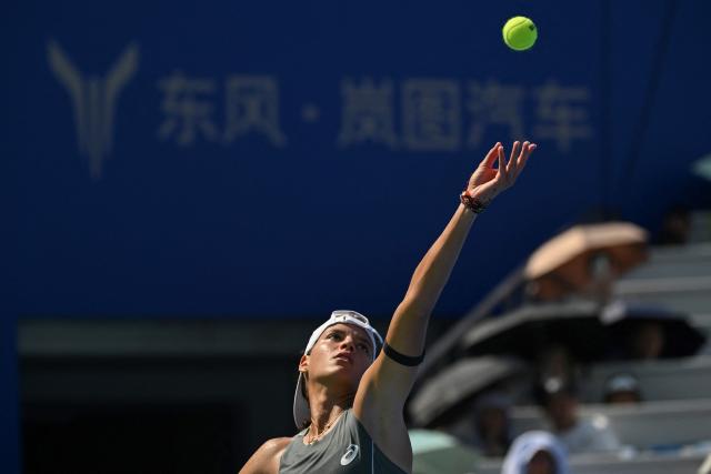 Colombia's Emiliana Arango serves against to Russia's Liudmila Samsonova during their women's singles match at the Wuhan Open tennis tournament in Wuhan, Central China's Hubei province on October 7, 2025. (Photo by Adek BERRY / AFP)