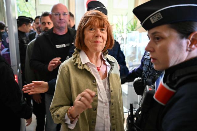 Gisele Pelicot arrives for the appeal trial in the Mazan rape case at the Nimes courthouse, southern France, in Nimes on October 7, 2025. The trial takes place at the Court of Appeal in Nîmes from October 6 to October 9, 2025. Only one of the 51 men convicted in Avignon during the first trial will ultimately be tried on appeal. The sixteen others who had appealed all withdrew their appeals. (Photo by Christophe Simon / AFP)