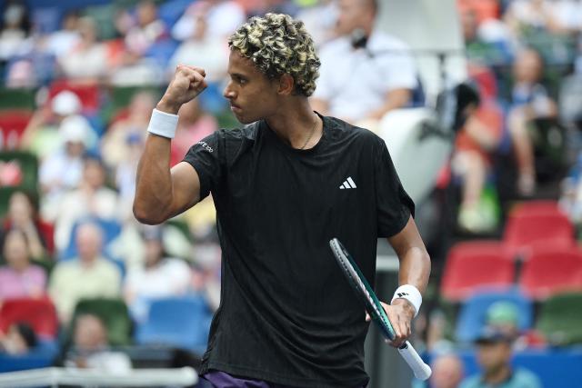 Canada’s Gabriel Diallo reacts in the men's singles match against Belgium’s Zizou Bergs at the Shanghai Masters tennis tournament in Shanghai on October 7, 2025. (Photo by Jade Gao / AFP)