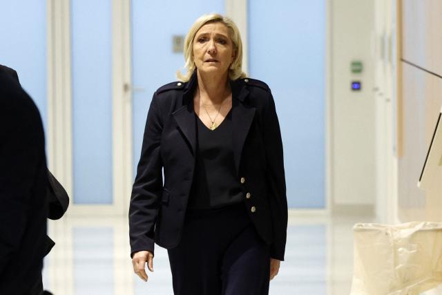 (FILES) French far-right Rassemblement National (RN) Member of Parliament Marine Le Pen arrives for the closing arguments hearing in the trial on suspicion of embezzlement of European public funds, at a court in Paris on November 13, 2024. The Council of State will examine, on October 10, 2025, Marine Le Pen's appeal against her automatic resignation from the departmental council of Pas-de-Calais after being sentenced to five years of ineligibility for embezzlement of public funds by the Paris Criminal Court on March 31, 2025. (Photo by GEOFFROY VAN DER HASSELT / AFP)