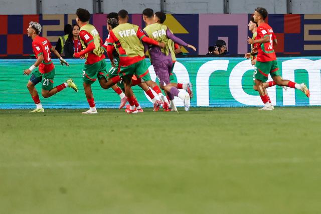 Morocco's foward #21 Yassir Zabiri celebrates scoring his team's second goal during the 2025 FIFA U-20 World Cup round of 16 football match between Morocco and South Korea at El Teniente Stadium in Rancagua, Chile on October 9, 2025. (Photo by Raul BRAVO / AFP)