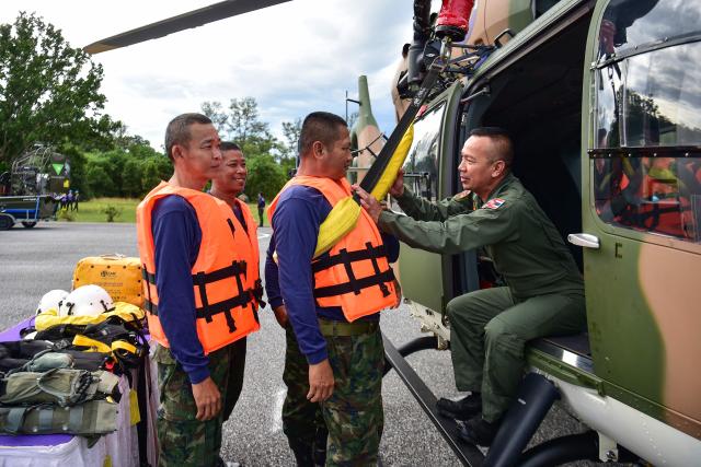 Thai Marines take part in an exercise in anticipation of floods during the rainy season in the Chulabhorn military camp in Thailand's southern province of Narathiwat on October 10, 2025. (Photo by Madaree TOHLALA / AFP)