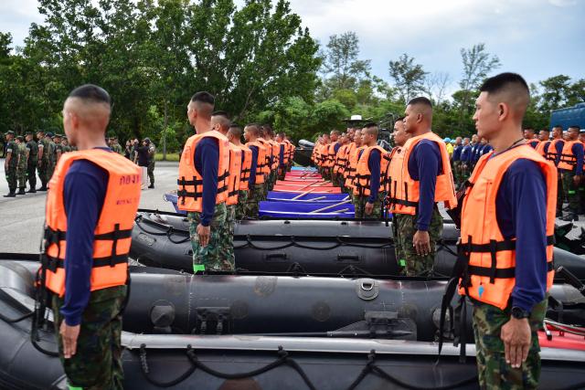 Thai Marines take part in an exercise in anticipation of floods during the rainy season in the Chulabhorn military camp in Thailand's southern province of Narathiwat on October 10, 2025. (Photo by Madaree TOHLALA / AFP)