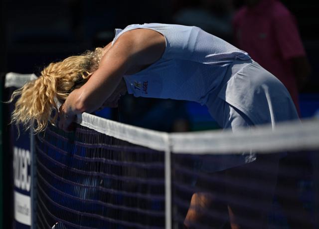 Czech Republic’s Katerina Siniakova reacts after losing a point against USA’s Jessica Pegula during their women’s singles match at the Wuhan Open tennis tournament in Wuhan, Central China’s Hubei province on October 10, 2025. (Photo by ADEK BERRY / AFP)