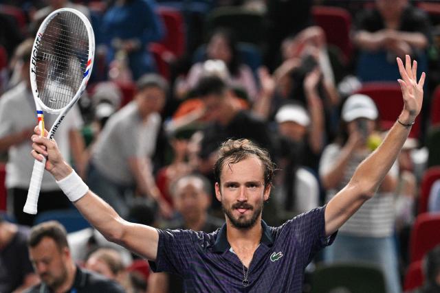 Russia's Daniil Medvedev celebrates beating Australia's Alex de Minaur in their men's singles quarter-final match at the Shanghai Masters tennis tournament in Shanghai on October 10, 2025. (Photo by HECTOR RETAMAL / AFP)