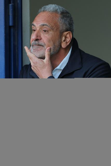 President of the Chilean Football Federation, Pablo Milad, gestures during the international football friendly match between Chile and Peru at the Bicentenario de La Florida Stadium in Santiago on October 10, 2025. (Photo by Javier TORRES / AFP)
