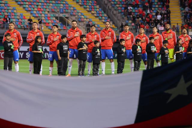 Chile's players pose during the international football friendly match between Chile and Peru at the Bicentenario de La Florida Stadium in Santiago on October 10, 2025. (Photo by Javier TORRES / AFP)