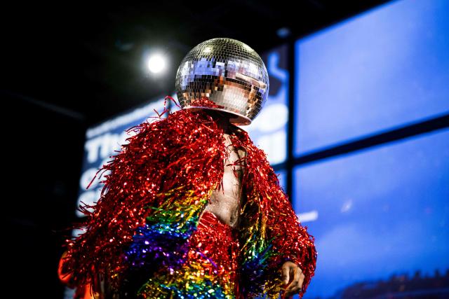 (FILES) Dancers vogue as they compete during the "Stars of Paris are Shining Ball", a voguing event at la Gaite Lyrique, in Paris, on June 17, 2023. She moves LGBT+ communities around the world and has inspired Madonna, Beyoncé, and Lady Gaga: ballroom, a queer culture from which voguing originates and long present in Paris, is spreading in France with a recently launched scene in Lille. (Photo by Julie SEBADELHA / AFP)