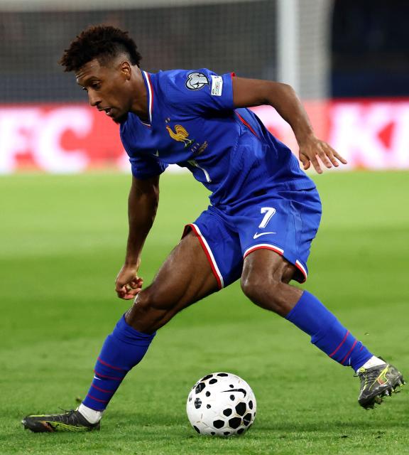 France's forward #07 Kingsley Coman controls the ball during the FIFA World Cup 2026 Group D European qualification football match between France and Azerbaijan at the Parc des Princes Stadium in Paris on October 10, 2025. (Photo by FRANCK FIFE / AFP)