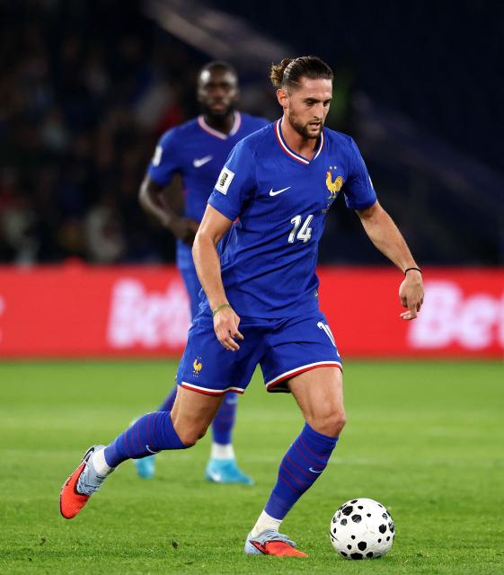 France's midfielder #14 Adrien Rabiot controls the ball during the FIFA World Cup 2026 Group D European qualification football match between France and Azerbaijan at the Parc des Princes Stadium in Paris on October 10, 2025. (Photo by FRANCK FIFE / AFP)