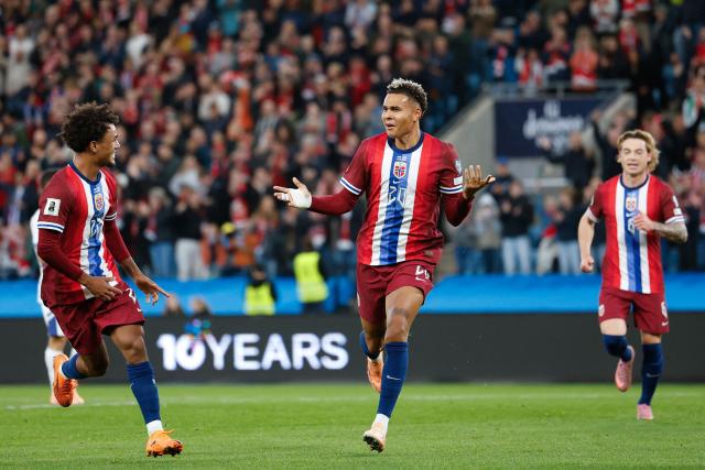 Norway's midfielder #20 Antonio Nusa (C) and Norway's midfielder #22 Oscar Bobb (L) celebrates the opening goal during the 2026 World Cup qualifiers Europe zone group I football match between Norway and Israel on October 11, 2025 in Oslo, Norway.  (Photo by Jonas Been Henriksen / NTB / AFP) / Norway OUT