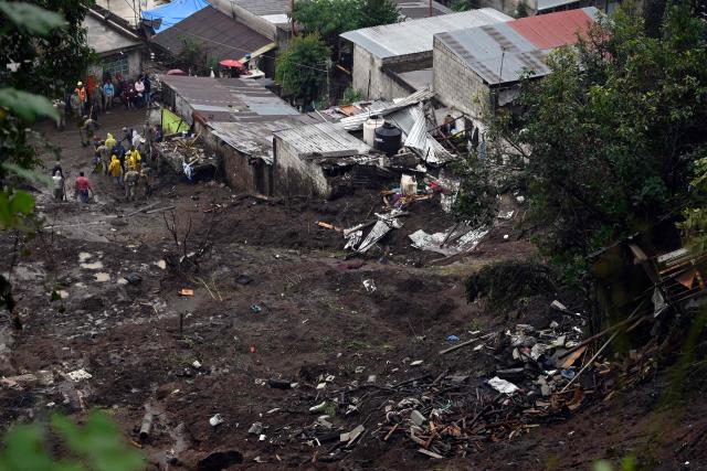 A view of a landslide in the Monterrey neighborhood due to the rains in the municipality of Huauchinango, Puebla State, Mexico, taken on October 11, 2025. The death toll from heavy rains in Mexico rose to 37 on Saturday after nine more fatalities were confirmed, the Mexican government reported. (Photo by Alfredo ESTRELLA / AFP)