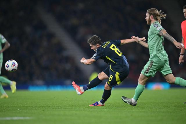 Scotland's midfielder #08 Billy Gilmour shoots but fails to score during the 2026 World Cup Group C qualifier football match between Scotland and Belarus, at Hampden Park Stadium, in Glasgow, on October 12, 2025. (Photo by ANDY BUCHANAN / AFP)