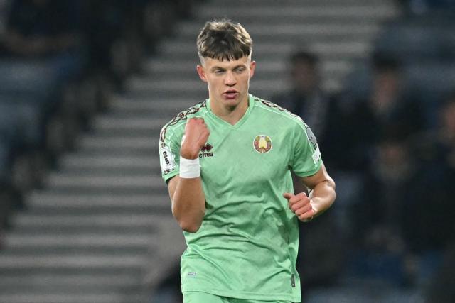 Belarus' forward #21 Gleb Kuchko celebrates after scoring their late first goal during the 2026 World Cup Group C qualifier football match between Scotland and Belarus, at Hampden Park Stadium, in Glasgow, on October 12, 2025. (Photo by ANDY BUCHANAN / AFP)