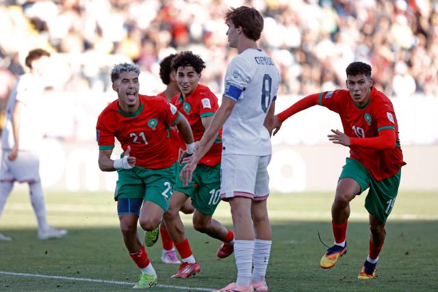 Morocco's forward #21 Yassir Zabiri celebrates after an own goal scored by United States' defender #04 Joshua Wynder (out of frame) during the 2025 FIFA U-20 World Cup quarter-final football match between United States and Morocco at the El Teniente Stadium in Rancagua, Chile on October 12, 2025. (Photo by Raul BRAVO / AFP)