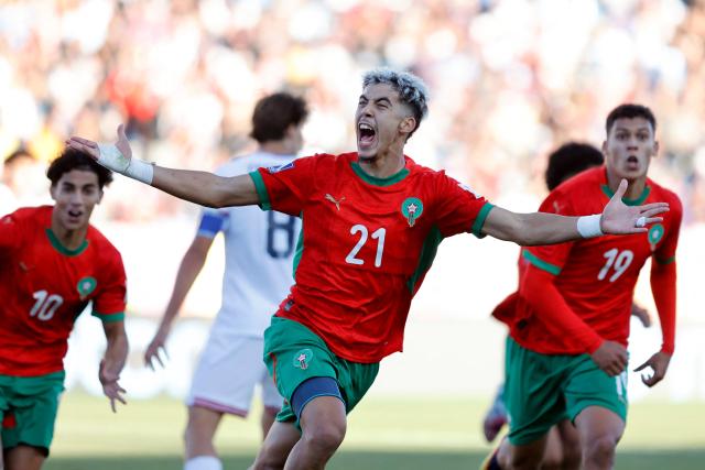 Morocco's foward #21 Yassir Zabiri celebrates after an own goal scored by United States' defender #04 Joshua Wynder (out of frame) during the 2025 FIFA U-20 World Cup quarter-final football match between United States and Morocco at the El Teniente Stadium in Rancagua, Chile on October 12, 2025. (Photo by Raul BRAVO / AFP)