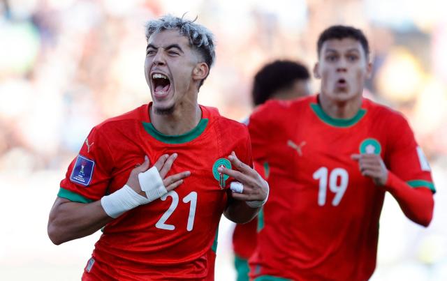 Morocco's forward #21 Yassir Zabiri celebrates after an own goal scored by United States' defender #04 Joshua Wynder (out of frame) during the 2025 FIFA U-20 World Cup quarter-final football match between United States and Morocco at the El Teniente Stadium in Rancagua, Chile on October 12, 2025. (Photo by Raul BRAVO / AFP)