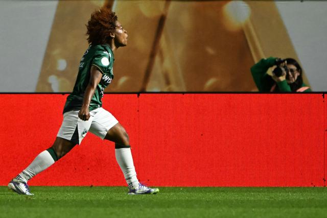Deportivo Cali's forward #09 Maria Marquinez celebrates scoring her team's first goal during the 2025 Women's Copa Libertadores quarter-final football match between Colombia's Deportivo Cali and Brazil's Sao Paulo at the Florencio Sola Stadium in Banfield, Buenos Aires province on October 12, 2025. (Photo by Luis ROBAYO / AFP)