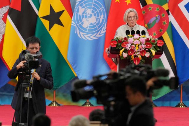 Iceland’s President Halla Tomasdottir delivers a speech during the opening ceremony of the Global Women’s Summit at the China National Convention Center in Beijing on October 13, 2025. (Photo by Ken Ishii / POOL / AFP)