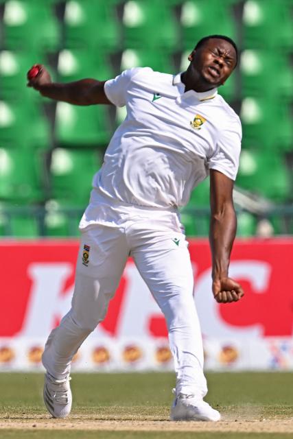 South Africa's Kagiso Rabada delivers a ball during the second day of the first Test cricket match between Pakistan and South Africa at the Gaddafi Stadium in Lahore on October 13, 2025. (Photo by Aamir QURESHI / AFP)