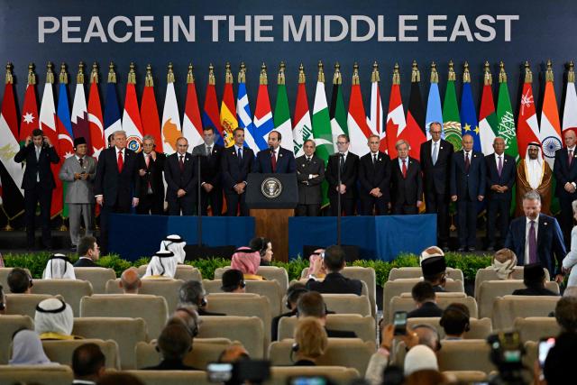 Egypt's President Abdel Fattah al-Sisi (C) delivers a statement during a summit on Gaza in Sharm el-Sheikh on October 13, 2025. Trump landed in Egypt on October 13 for a summit on Gaza, following a lightning visit to Israel after a ceasefire he brokered entered into force. (Photo by Khaled DESOUKI / AFP)