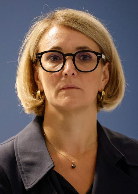 France's newly-appointed delegate Minister to the Interior Marie-Pierre Vedrenne reacts as she visits the police station of Saint-Quentin-en-Yvelines, in Elancourt near Paris, on October 13, 2025. (Photo by Ian LANGSDON / POOL / AFP)