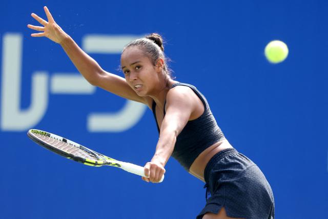Canada's Leylah Fernandez hits a return to the USA's Hailey Baptiste during their women's singles match at the Japan Open tennis tournament in Osaka on October 14, 2025. (Photo by PAUL MILLER / AFP)