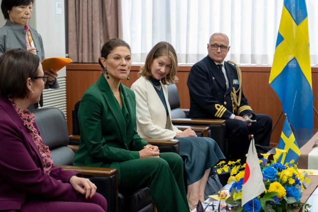 Crown Princess Victoria of Sweden (2nd L) visits the Joint Staff College, an educational institution administered by the Ministry of Defence's Joint Staff Office, in Tokyo on October 14, 2025. (Photo by Kazuhiro NOGI / AFP)