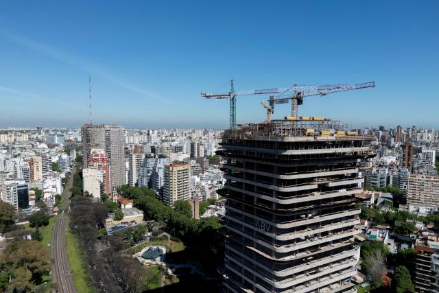 Aerial view of buildings under construction in Buenos Aires taken on October 14, 2025. Argentina's statistics agency INDEC is expected to announce September’s inflation rate later in the day. (Photo by Luis ROBAYO / AFP)
