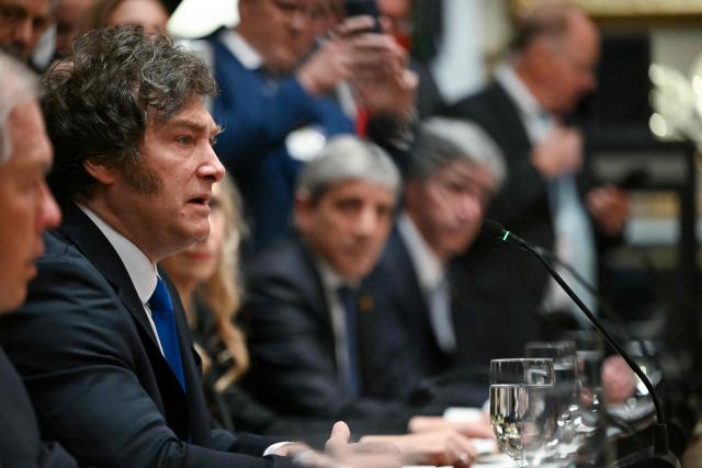 Argentina's President Javier Milei speaks during a meeting with US President Donald Trump in the Cabinet Room at the White House in Washington, DC on October 14, 2025. (Photo by ANDREW CABALLERO-REYNOLDS / AFP)