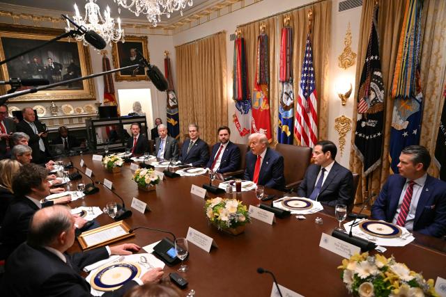 US President Donald Trump (3rd R) meets with Argentina's President Javier Milei (2nd L) in the Cabinet Room at the White House in Washington, DC, on October 14, 2025. (Photo by ANDREW CABALLERO-REYNOLDS / AFP)