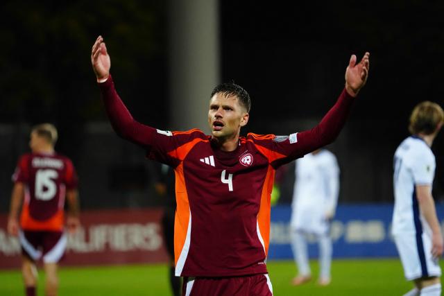 Latvia's defender #04 Roberts Veips reacts during the 2026 World Cup qualifying group K football match between Latvia and England at the Daugava Stadium in Riga, Latvia on October 14, 2025, (Photo by Gints Ivuskans / AFP)