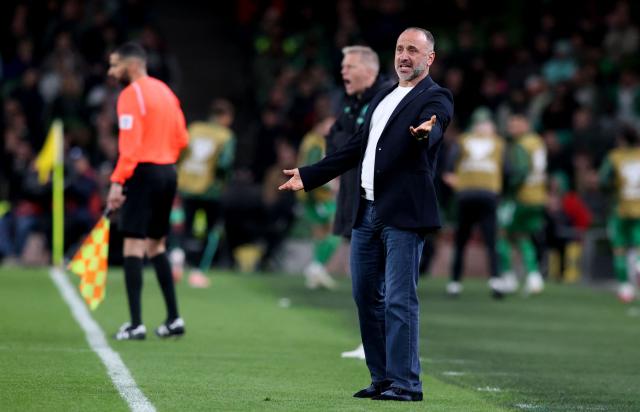 Armenia's head coach Yegishe Melikyan shouts instructions to the players from the touchline during the 2026 World Cup Group F qualifier football match between Republic of Ireland and Armenia, at Aviva Stadium, in Dublin, on October 14, 2025. (Photo by Paul Faith / AFP)
