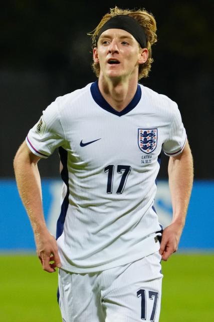 England's midfielder #17 Anthony Gordon celebrates scoring the opening goal during the 2026 World Cup qualifying group K football match between Latvia and England at the Daugava Stadium in Riga, Latvia on October 14, 2025, (Photo by Gints Ivuskans / AFP) / ALTERNATE CROP