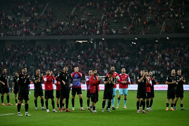 Georgia’s players acknowledge the fans at the end of the FIFA World Cup 2026 Group E European qualification football match between Turkey and Georgia at the Kocaeli Stadium, in Kocaeli, on October 14, 2025. (Photo by OZAN KOSE / AFP)