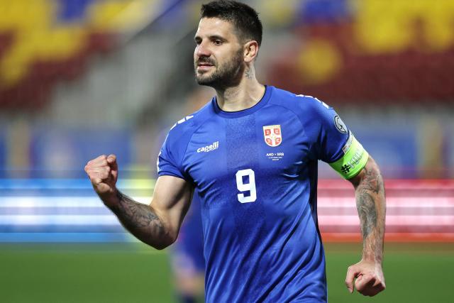Serbia's forward #09 Aleksandar Mitrovic celebrates after scoring Serbia's third goal from the penalty spot during the FIFA World Cup 2026 Group K European qualification football match between Andorra and Serbia, at the New FAF Stadium in Encamp, on October 14, 2025. (Photo by Valentine CHAPUIS / AFP)