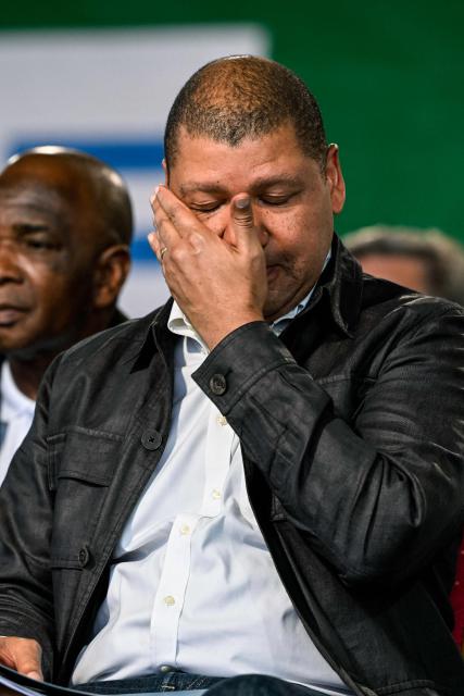 Presidential candidate for the Democratic Congress (CODE) Jean-Loui Billon reacts during his campaign rally in the commune of Cocody in Abidjan on October 14, 2025. Ivory Coast Presidential election is scheduled for October 25, 2025. (Photo by Sia KAMBOU / AFP)
