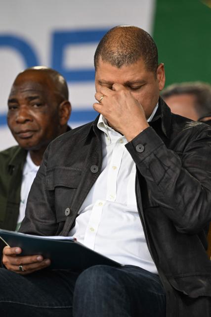 Presidential candidate for the Democratic Congress (CODE) Jean-Loui Billon reacts during his campaign rally in the commune of Cocody in Abidjan on October 14, 2025. Ivory Coast Presidential election is scheduled for October 25, 2025. (Photo by Sia KAMBOU / AFP)