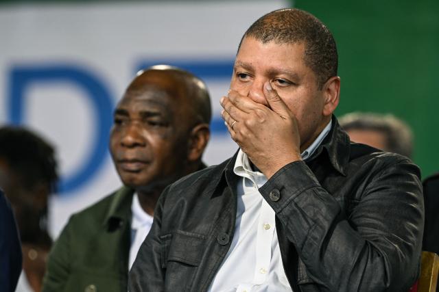 Presidential candidate for the Democratic Congress (CODE) Jean-Loui Billon reacts during his campaign rally in the commune of Cocody in Abidjan on October 14, 2025. Ivory Coast Presidential election is scheduled for October 25, 2025. (Photo by Sia KAMBOU / AFP)