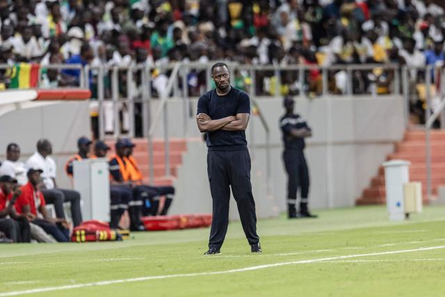 Senegal's coach Pape Thiaw looks on during the FIFA World Cup 2026 Africa qualifiers group B match between Senegal and Mauritania at Stade Abdoulaye Wade, in Diamniadio on October 14, 2025. (Photo by Patrick Meinhardt / AFP)