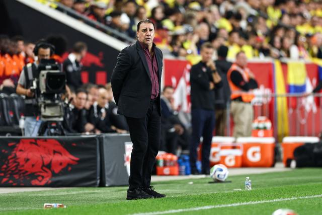 Colombia's Argentine coach Nestor Lorenzo watches his players from the touchline during the international friendly football match between Canada and Colombia at Sports Illustrated Stadium in Harrison, New Jersey, on October 14, 2025. (Photo by CHARLY TRIBALLEAU / AFP)