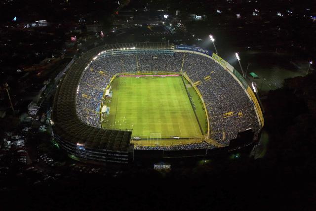 This aerial view shows the stadium ahead of the 2026 FIFA World Cup Concacaf qualifier football match between El Salvador and Guatemala at the Cuscatlan Stadium in San Salvador on October 14, 2025. (Photo by Marvin RECINOS / AFP)