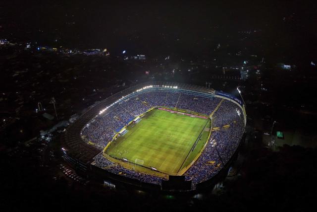 This aerial view shows the stadium ahead of the 2026 FIFA World Cup Concacaf qualifier football match between El Salvador and Guatemala at the Cuscatlan Stadium in San Salvador on October 14, 2025. (Photo by Marvin RECINOS / AFP)