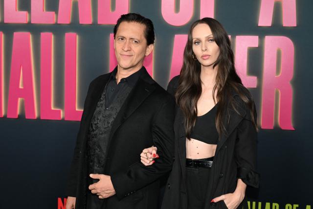 US actor Clifton Collins Jr. (L) and actress Bailee Mykell attend the Los Angeles special screening of Netflix's "Ballad of a Small Player" at the Egyptian Theatre Hollywood in Los Angeles on October 14, 2025. (Photo by Robyn Beck / AFP)