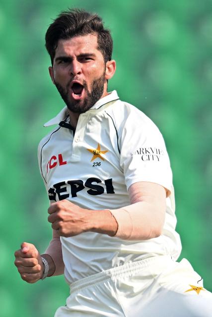 Pakistan's Shaheen Shah Afridi celebrates after taking the wicket of South Africa's Tony de Zorzi during the fourth day of the first Test cricket match between Pakistan and South Africa at the Gaddafi Stadium in Lahore on October 15, 2025. (Photo by Aamir QURESHI / AFP)