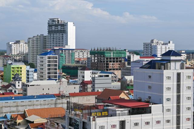 (FILES) A general view of a high-rise buildings in Poipet town in Cambodia's western Banteay Meanchey province on the border with Thailand, on June 25, 2025. South Korea on October 15, 2025 imposed travel bans on parts of Cambodia with South Korea shaken by the torture and killing of a college student there.
"The Bokor Mountain area in Kampot Province, Bavet City, and Poipet City are designated as travel ban zones," the foreign ministry said in a statement. (Photo by TANG CHHIN Sothy / AFP)