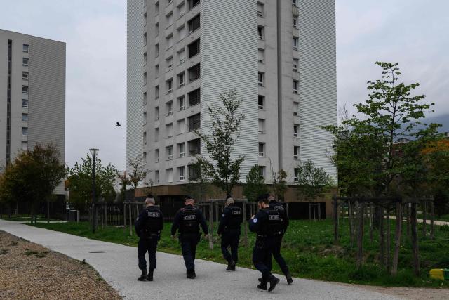 Police officers patrol in the Mistral neighbourhood, as part of an anti-drug operation, in Grenoble, on October 15, 2025. (Photo by JEFF PACHOUD / AFP)