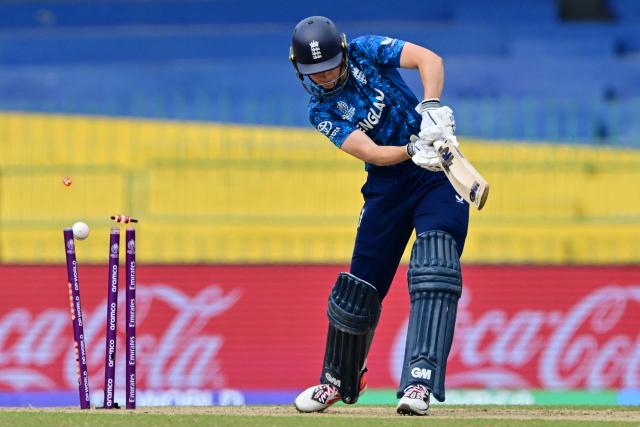 England's Amy Jones is clean bowled by Pakistan's captain Fatima Sana during the ICC Women's Cricket World Cup 2025 one-day international (ODI) match between England and Pakistan at the R. Premadasa International Cricket Stadium in Colombo on October 15, 2025. (Photo by Ishara S. KODIKARA / AFP)