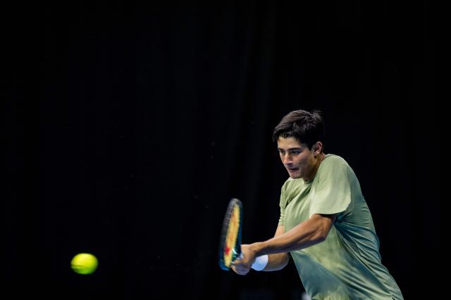 Italy's Federico Cina returns the ball to Bosnia's Damir Dzumhur during the European Open ATP tennis tournament in Brussels on October 15, 2025. (Photo by JASPER JACOBS / Belga / AFP) / Belgium OUT